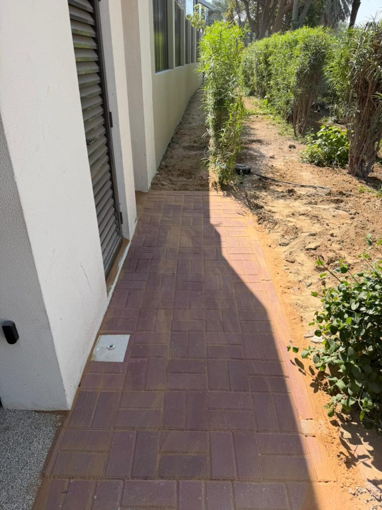 Interlock tile installation emirates hills Dubai Prime Stone Technical