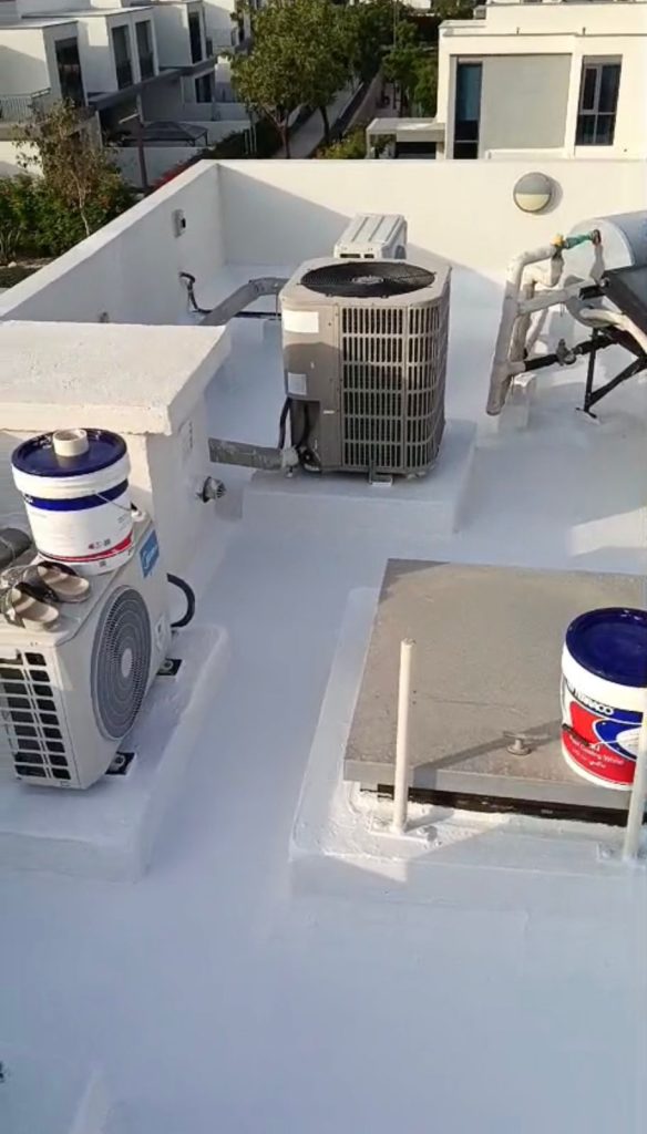 roof waterproofing company in Dubai working on villa roof leak repair